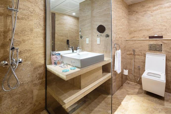 Imagen de la habitación del Hotel Barceló Al Jaddaf. Foto 19