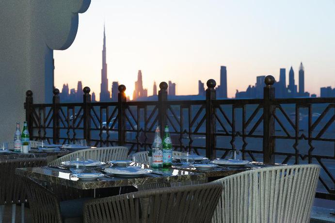 Imagen del bar/restaurante del Hotel Barceló Al Jaddaf. Foto 14