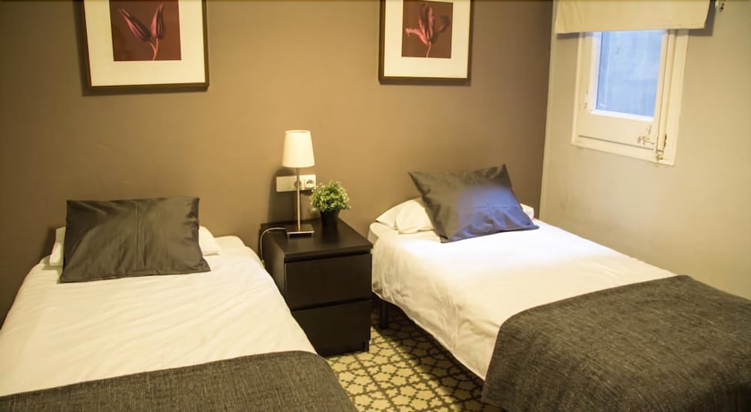 Imagen de la habitación del Hotel Barcelonaguest. Foto 12