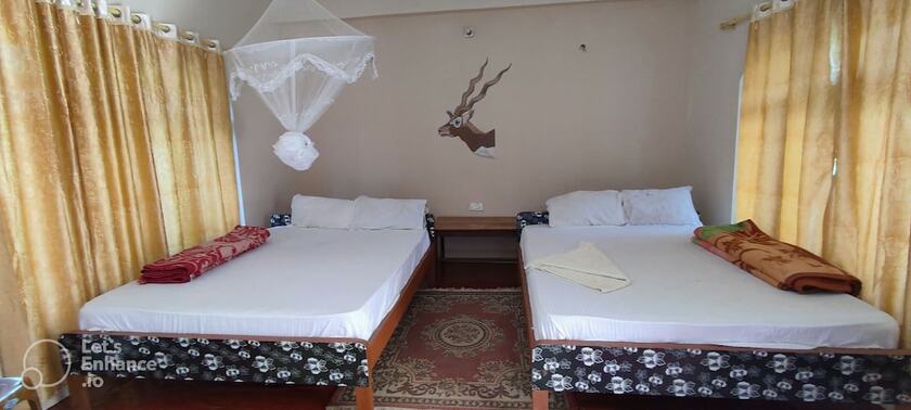 Imagen de la habitación del Hotel Bardia Jungle Cottage. Foto 15