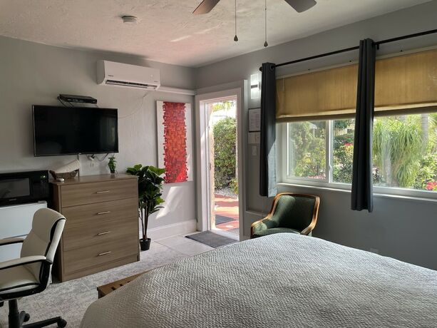 Imagen de la habitación del Hotel Barefoot Mailman Inn and Suites. Foto 17