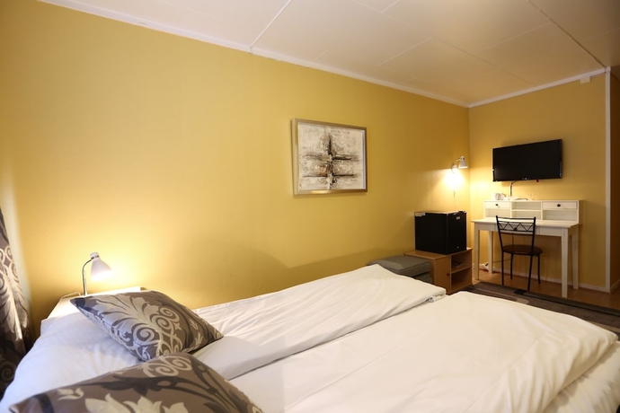 Imagen de la habitación del Hotel Barents Frokosthotell. Foto 7