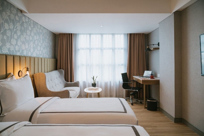 Imagen de la habitación del Hotel Barito Mansion. Foto 3