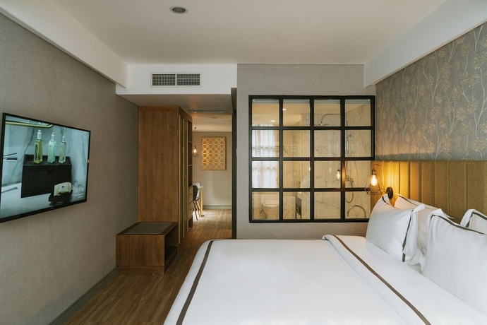Imagen de la habitación del Hotel Barito Mansion. Foto 12