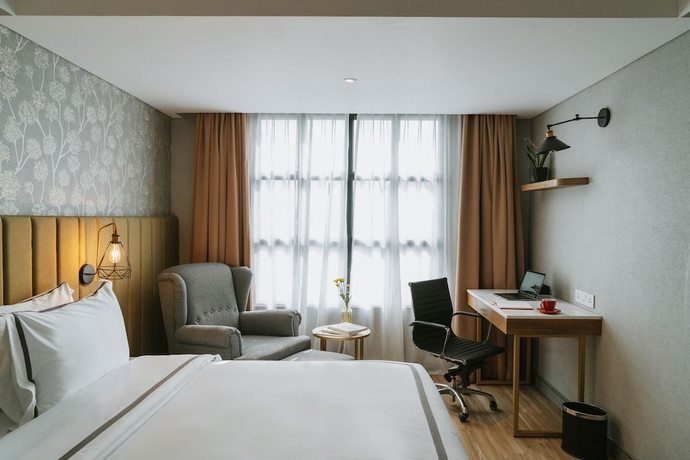 Imagen de la habitación del Hotel Barito Mansion. Foto 13