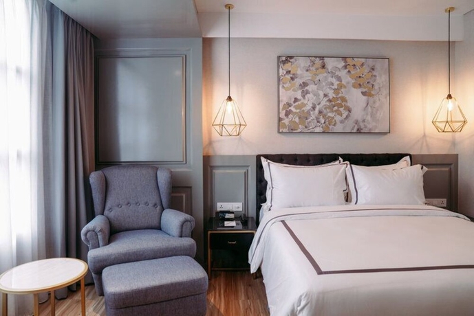 Imagen de la habitación del Hotel Barito Mansion. Foto 17