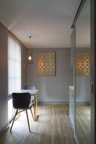 Imagen de la habitación del Hotel Barito Mansion. Foto 18