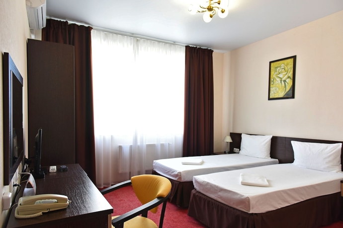 Imagen de la habitación del Hotel Barkhatnye Sezony Semeiny Kvartal. Foto 4