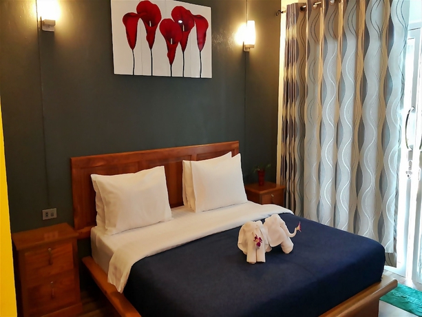 Imagen de la habitación del Hotel Barn Talaepu Resort. Foto 10