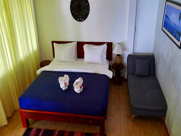 Imagen de la habitación del Hotel Barn Talaepu Resort. Foto 11