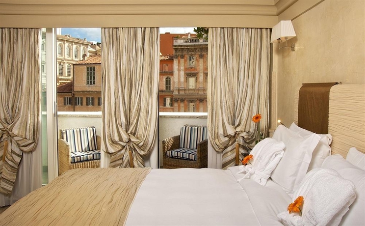 Imagen de la habitación del Hotel Barocco. Foto 11