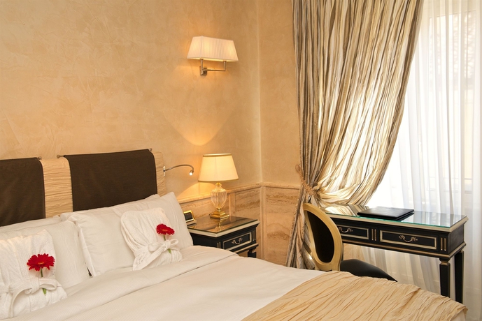 Imagen de la habitación del Hotel Barocco. Foto 14