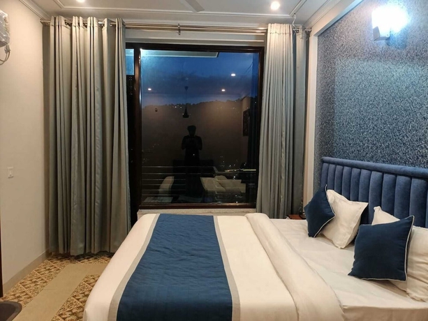 Imagen de la habitación del Hotel Barog Residency. Foto 2