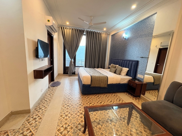 Imagen de la habitación del Hotel Barog Residency. Foto 7