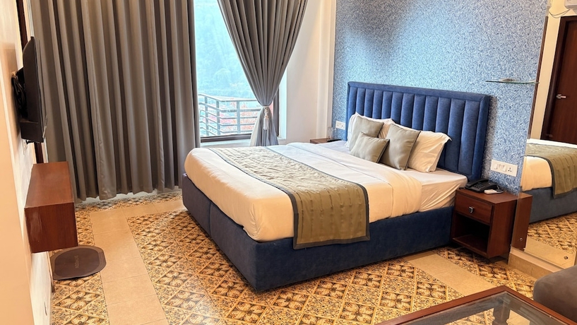 Imagen de la habitación del Hotel Barog Residency. Foto 9