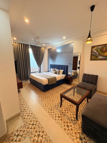 Imagen de la habitación del Hotel Barog Residency. Foto 10