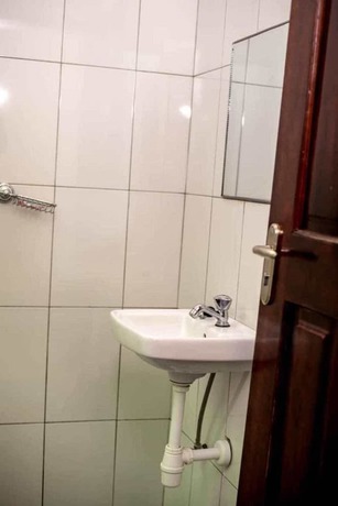 Imagen de la habitación del Hotel Baron Guest House. Foto 10