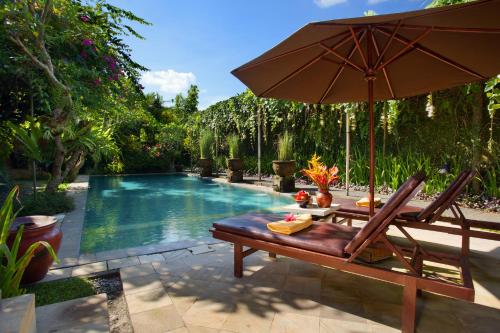 Imagen de la piscina del Hotel Barong Resort Ubud by Puri Signatures. Foto 6