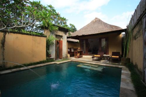 Imagen de la piscina del Hotel Barong Resort Ubud by Puri Signatures. Foto 8