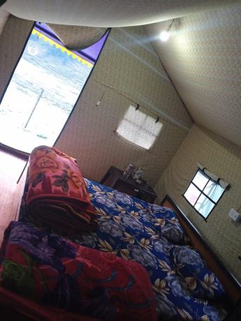 Imagen de la habitación del Hotel Barot Waterfall Camps And Domes. Foto 10