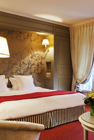 Imagen de la habitación del Hotel Barri&egrave;re Le Grand. Foto 8