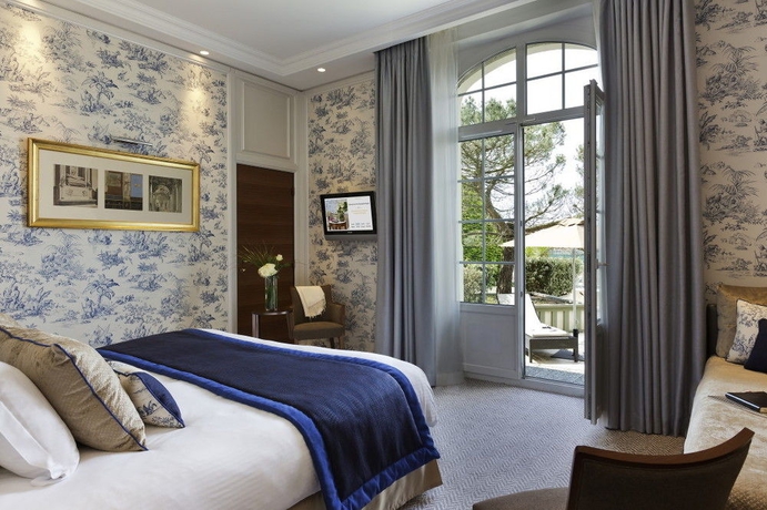 Imagen de la habitación del Hotel Barrière Le Normandy Deauville. Foto 3