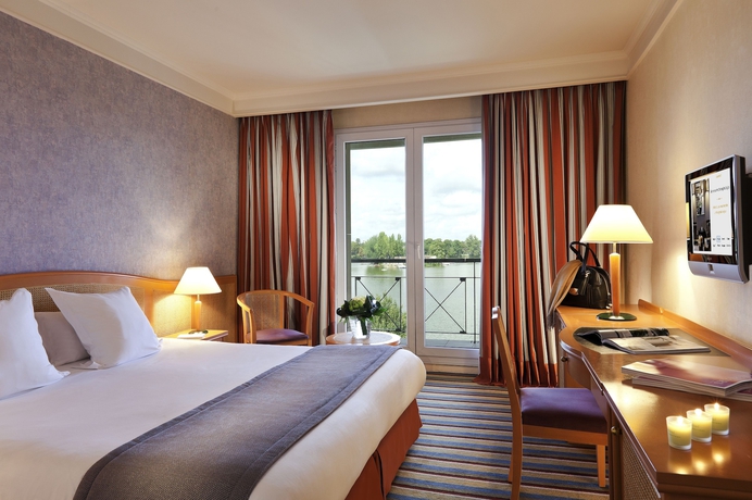 Imagen de la habitación del Hotel Barrière L'hôtel Du Lac. Foto 3