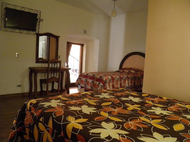 Imagen de la habitación del Hotel Barroco. Foto 11