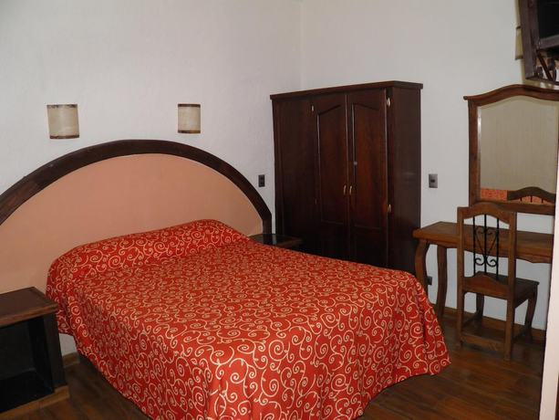 Imagen de la habitación del Hotel Barroco. Foto 16