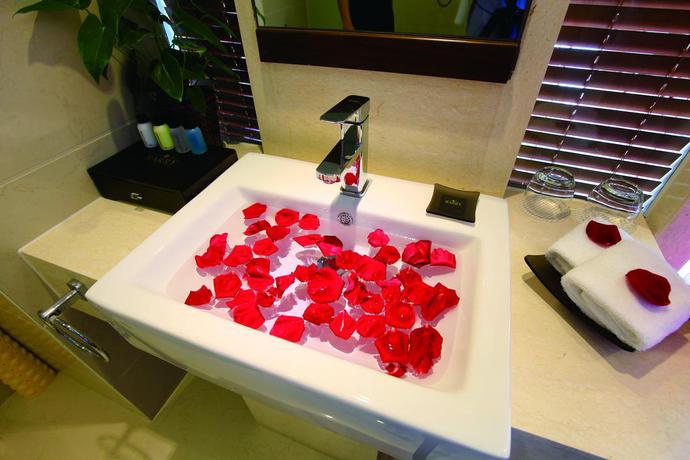 Imagen de la habitación del Hotel Barry Boutique Sanya. Foto 7