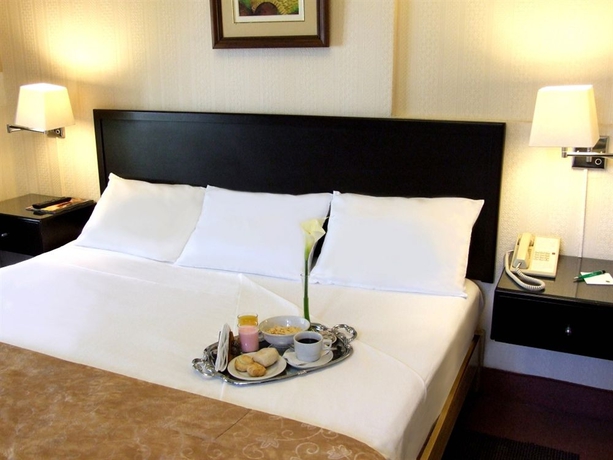 Imagen de la habitación del Hotel Basadre Suites. Foto 3