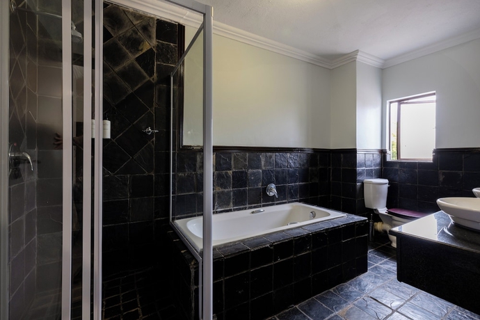 Imagen de la habitación del Hotel Basdenwood. Foto 12