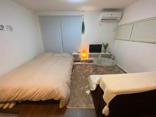 Imagen de la habitación del Hotel Base Hanegi Apartment. Foto 11