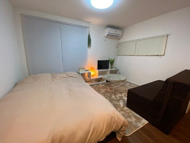 Imagen de la habitación del Hotel Base Hanegi Apartment. Foto 12