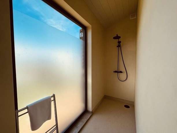 Imagen de la habitación del Hotel Basecamp Tiny House Eco-Resort. Foto 6