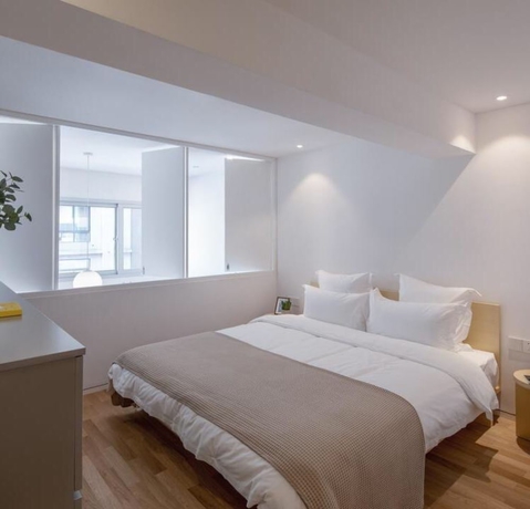 Imagen de la habitación del Hotel Baseliving Wending Serviced Apartment. Foto 3