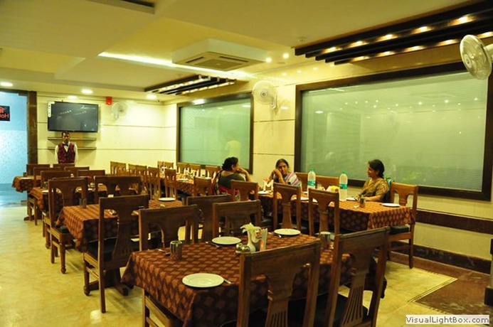 Imagen del bar/restaurante del Hotel Basera Brij Bhoomi. Foto 9