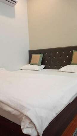 Imagen de la habitación del Hotel Basera, Patna. Foto 15