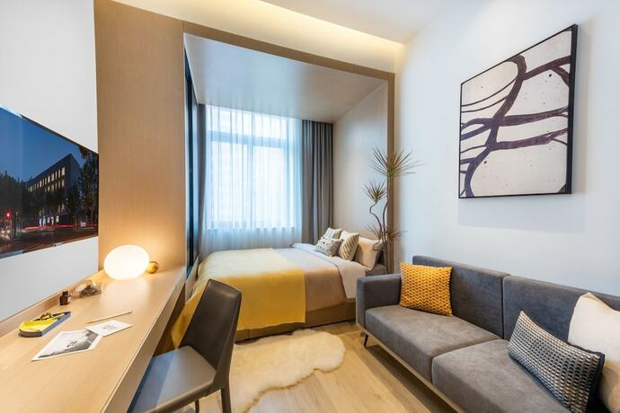 Imagen de la habitación del Hotel Base-sanlitun Serviced Apartment. Foto 14