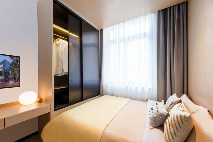 Imagen de la habitación del Hotel Base-sanlitun Serviced Apartment. Foto 19