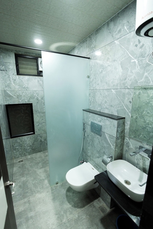 Imagen de la habitación del Hotel Basil Inn. Foto 14