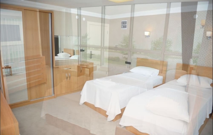 Imagen de la habitación del Hotel Basoglu Bulancak Otel. Foto 6