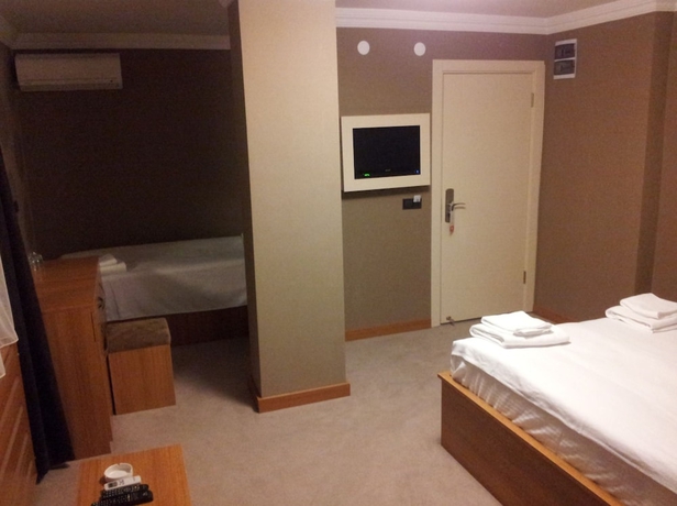 Imagen de la habitación del Hotel Basoglu Bulancak Otel. Foto 7