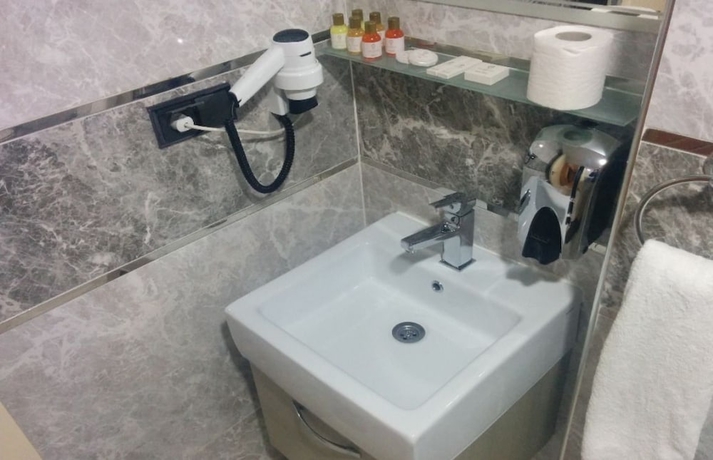 Imagen de la habitación del Hotel Basoglu Bulancak Otel. Foto 8