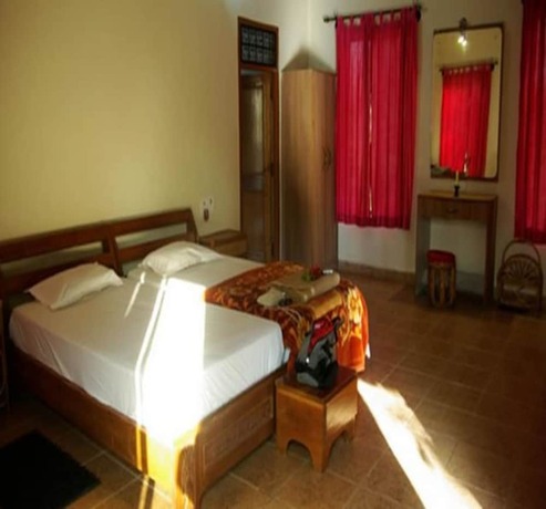 Imagen de la habitación del Hotel Bastar Jungle Resort. Foto 10