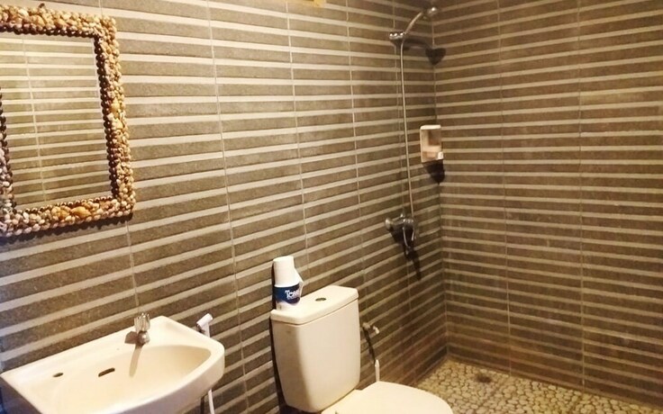 Imagen de la habitación del Hotel Bastianos Lembeh Dive Resort. Foto 23