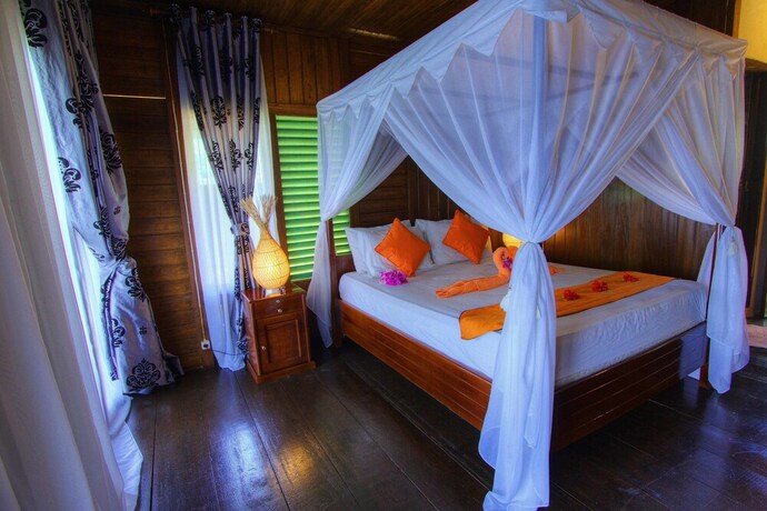 Imagen de la habitación del Hotel Bastianos Lembeh Dive Resort. Foto 30