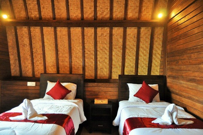 Imagen de la habitación del Hotel Bataran Garden Cottage. Foto 15