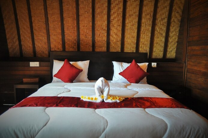 Imagen de la habitación del Hotel Bataran Garden Cottage. Foto 17