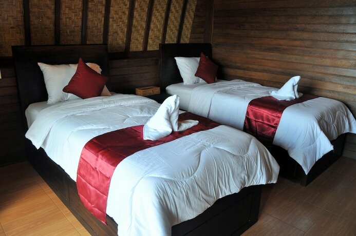 Imagen de la habitación del Hotel Bataran Garden Cottage. Foto 18